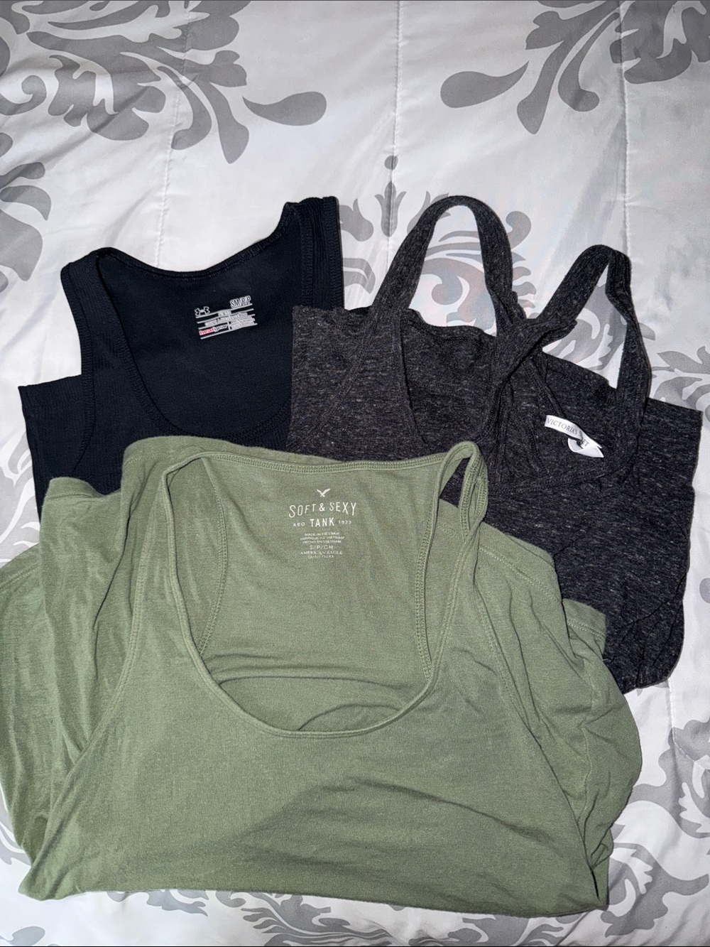 3 small tank tops, Black UA, Dark Gray VS and olive green American Eagle